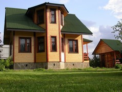 Дом после обшивки имитации бруса